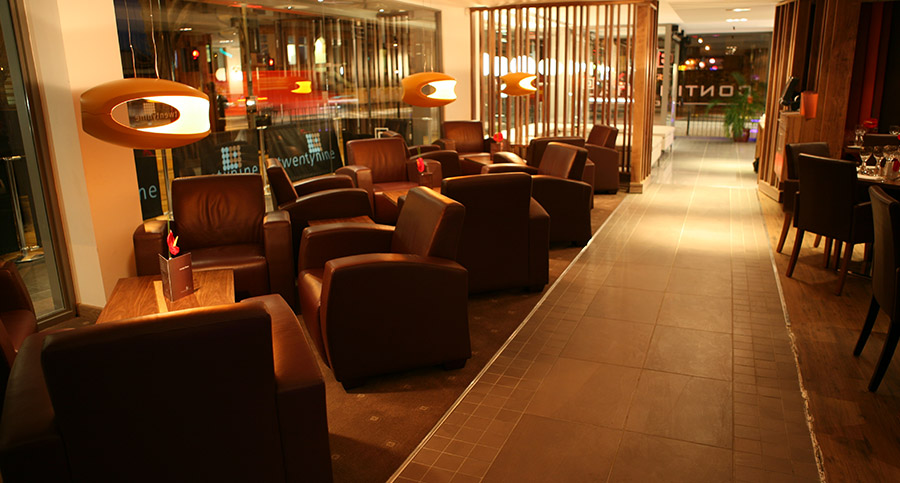 hotel bar seating area with wooden partition