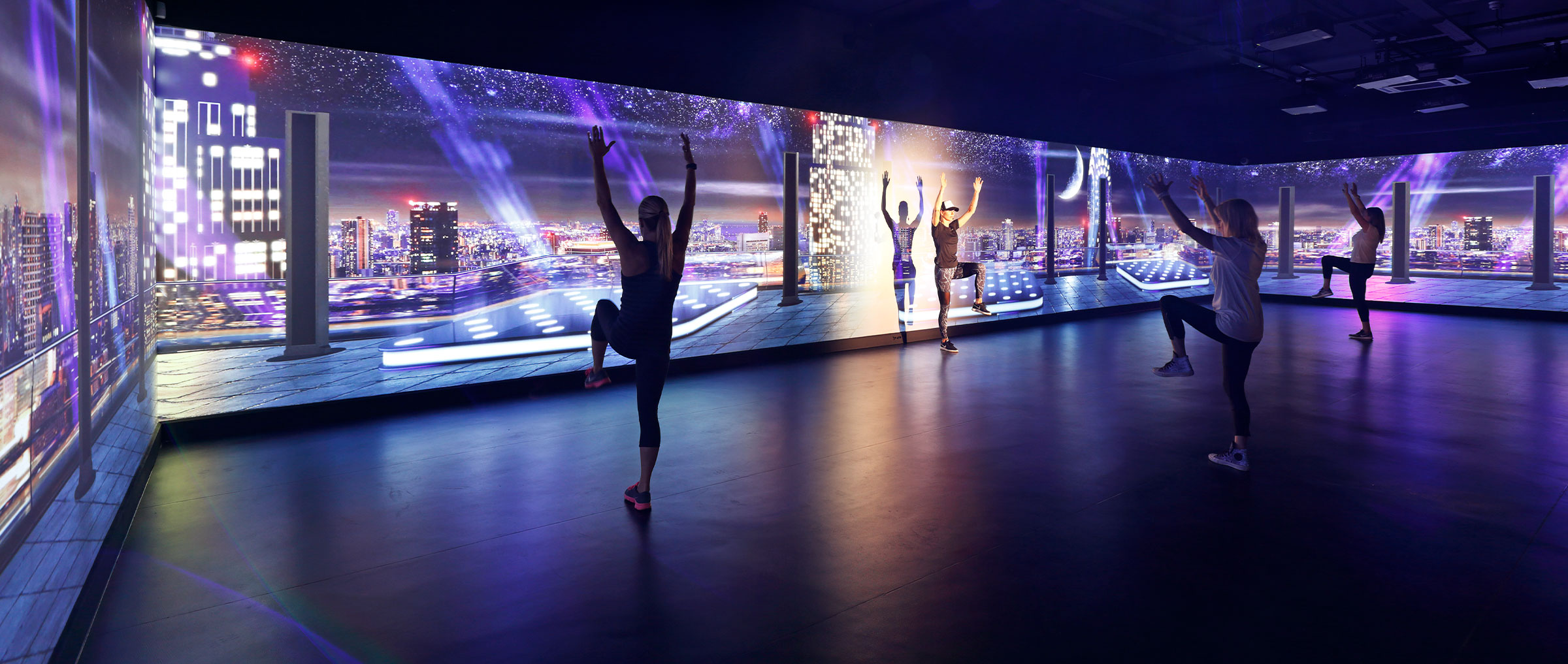 boutique fitness studio with dynamic lighting