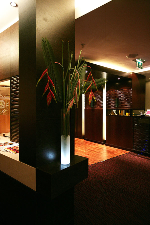 tall plant in newly designed hotel lobby