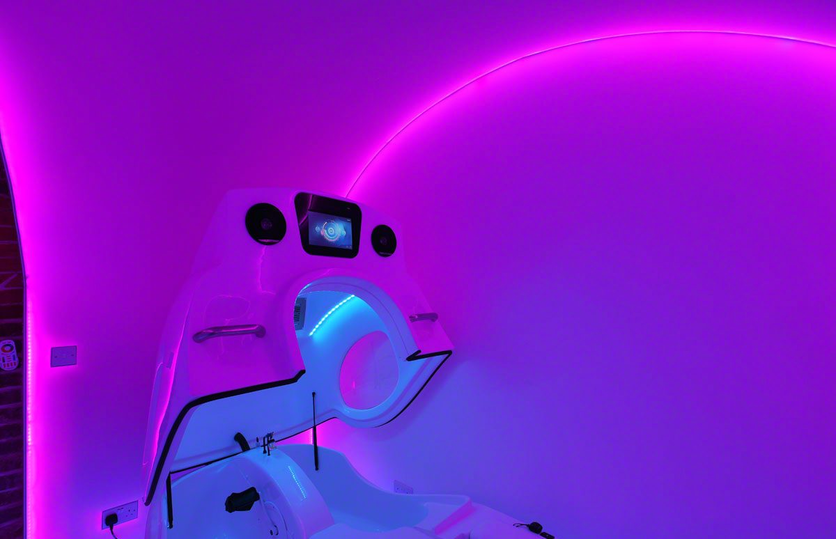 spa equipment in a purple lit room