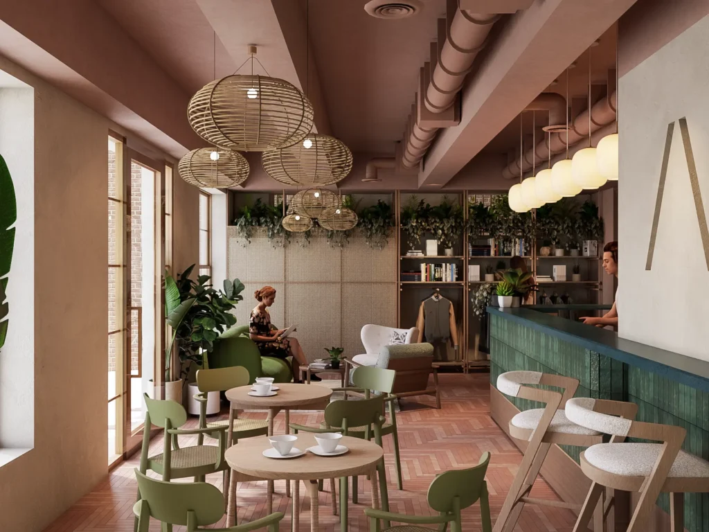 Café area with reddish tiled floor, bamboo lighting covers, sage green chairs, wooden tables, and a tiled café counter, creating a warm and stylish interior.
